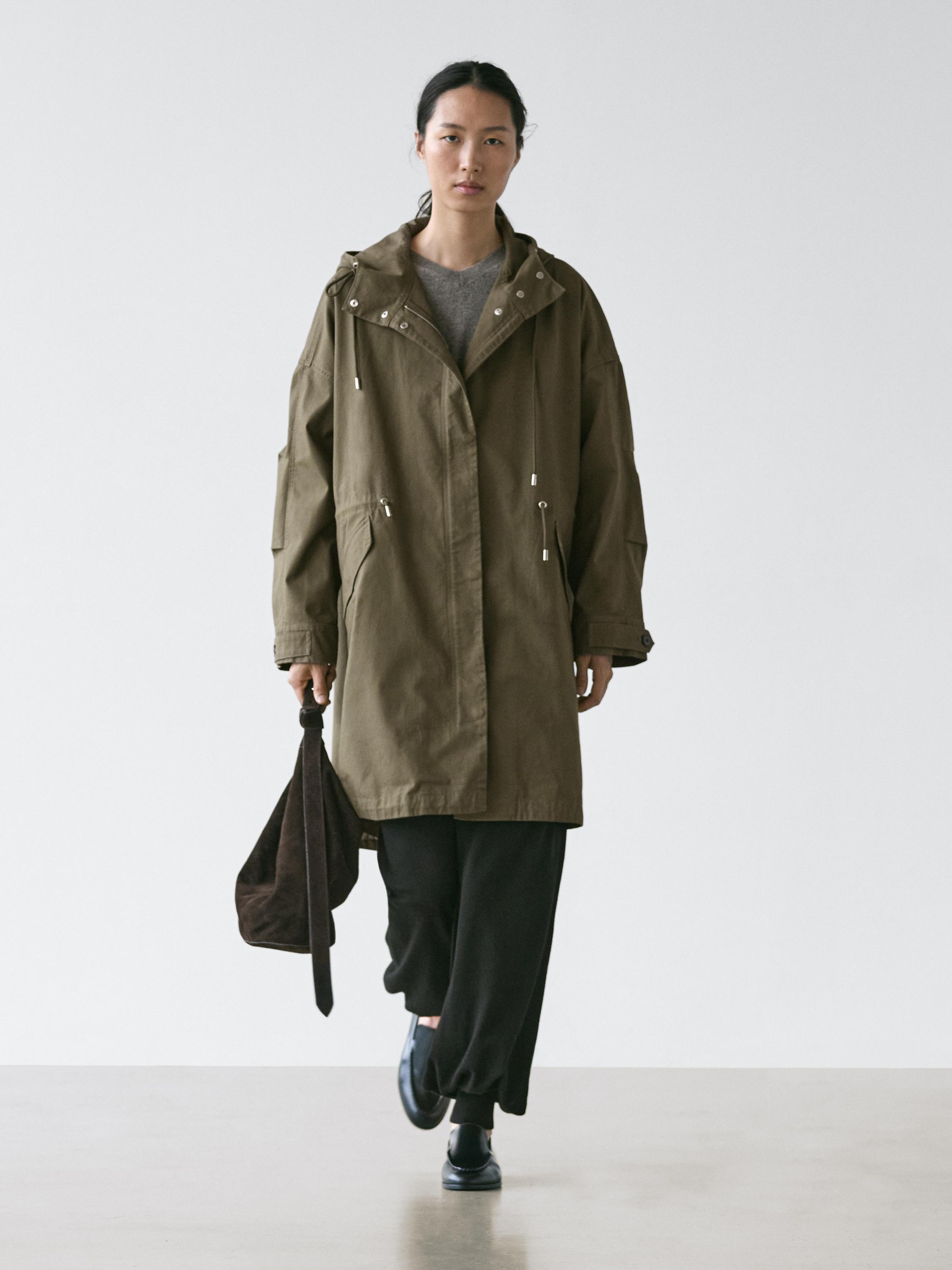 Technical fabric trench coat with hood